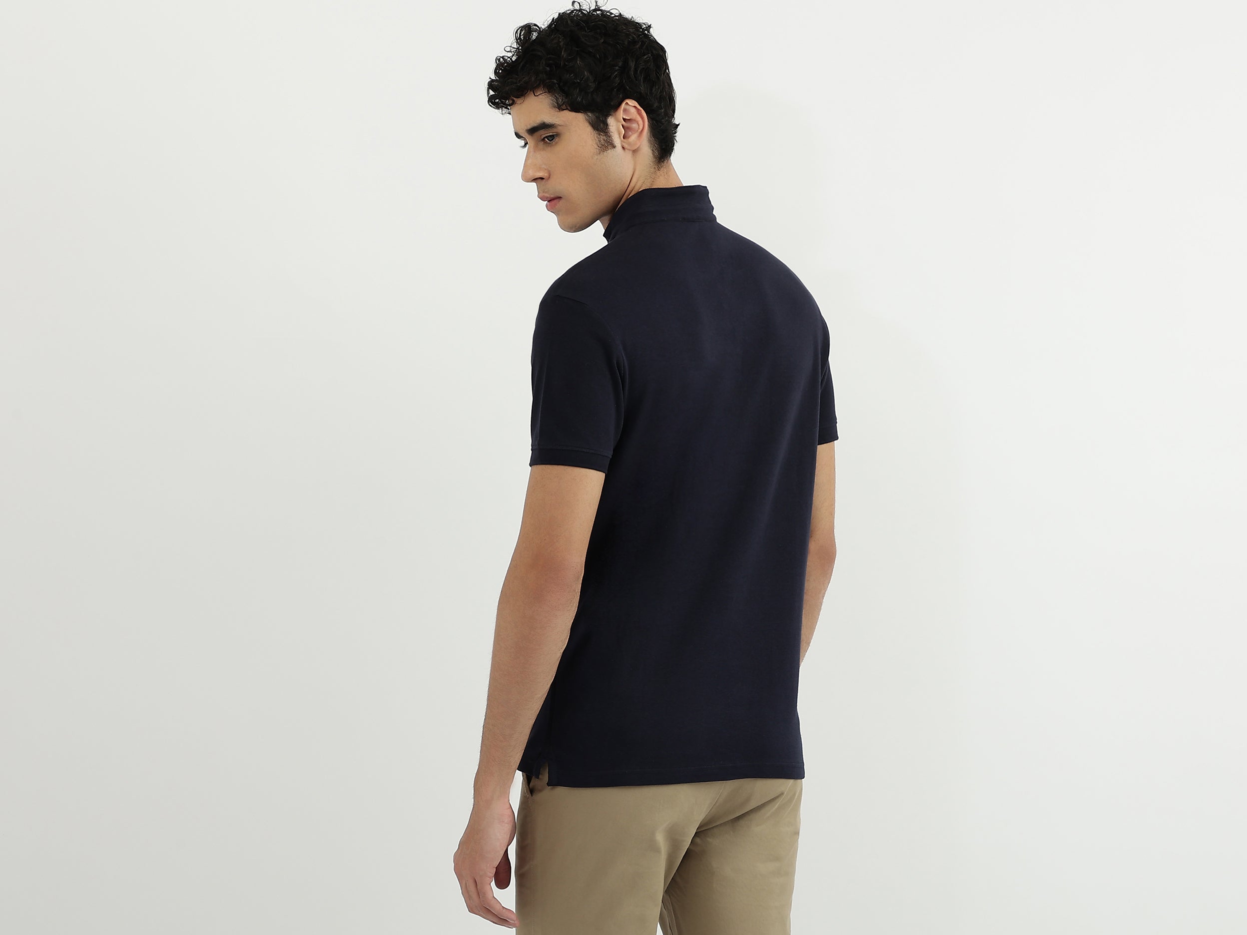 Men Solid Polo Neck Polo T-Shirt by United Colors of Benetton
