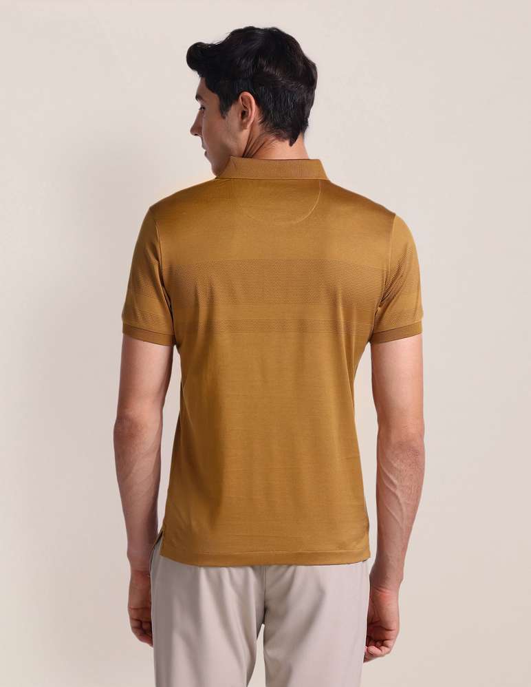 Men self design polo neck cotton blend brown T-shirt by U. S POLO ASSN.